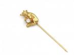 Matching pair of diamond set wolf stick pins in yellow gold
