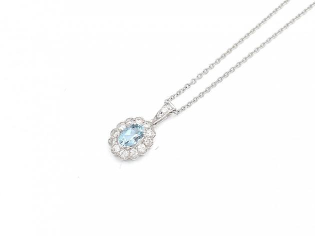Aquamarine and diamond floral cluster pendant in white gold