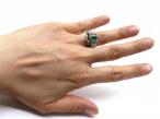 Art Deco emerald and diamond cluster ring in gold and platinum