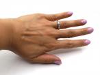 Art Deco style emerald cut diamond east to west diamond solitaire ring