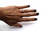 Diamond raised solitaire engagement ring in 18kt white gold