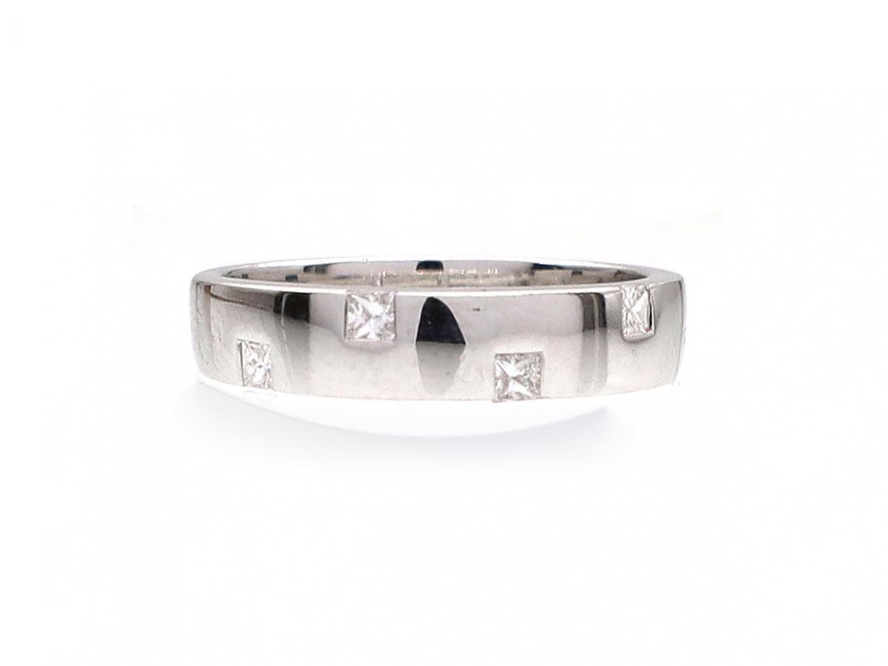 18kt white square wedding ring set with princess cut diamonds