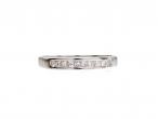 Contemporary princess cut diamond half eternity ring