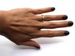 0.12ct round brilliant cut diamond solitaire ring in yellow gold