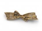 Edwardian diamond set brooch in platinum and yellow gold