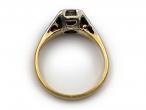 Antique diamond solitaire engagement ring with leaf motifs
