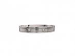 Platinum diamond set ring with incised borders