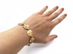 Art Nouveau flower and femme portrait bracelet in 18kt yellow gold