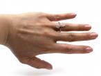 Antique diamond set bow ring in platinum and rose gold