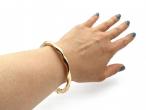 Vintage 9kt yellow gold soft twist hinged bangle