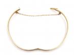 1980s engraved solid hinged bangle in 9kt yellow gold