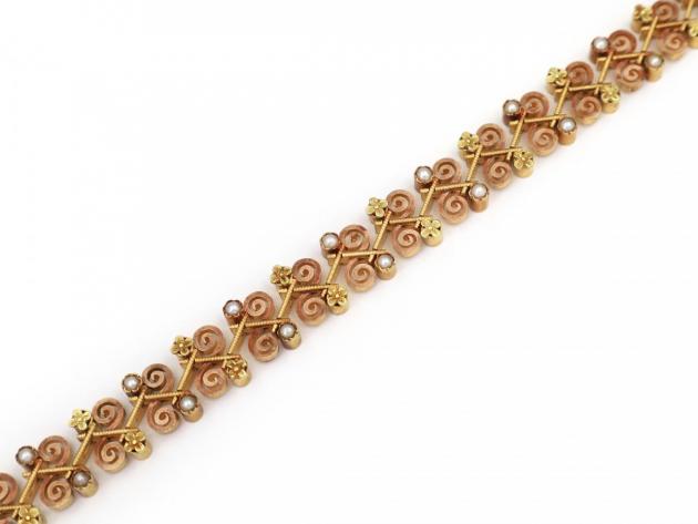 Antique French seed pearl, rose and yellow gold scrolling bracelet