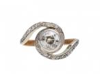 Art Nouveau diamond solitaire twist ring in platinum and gold