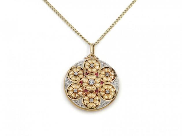 Antique diamond and ruby posy locket in yellow gold
