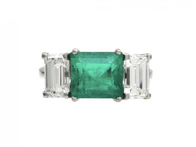 Vintage emerald and diamond three stone ring in 18kt white gold