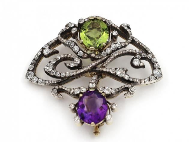 Art Nouveau peridot, amethyst and diamond brooch in silver on gold
