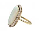 Edwardian oval opal and diamond cluster ring in 18kt yellow gold