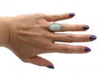 Edwardian oval opal and diamond cluster ring in 18kt yellow gold