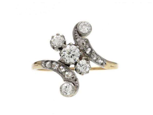 Edwardian diamond three stone twist ring in platinum and 18kt gold