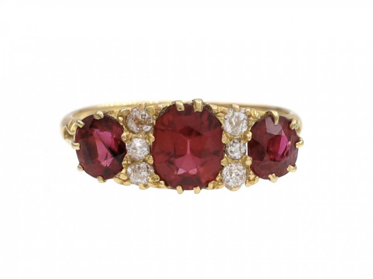 Victorian ruby and diamond three stone carved ring in 18kt yellow gold