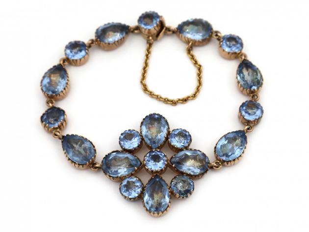 Georgian blue topaz floral pendant bracelet in yellow gold