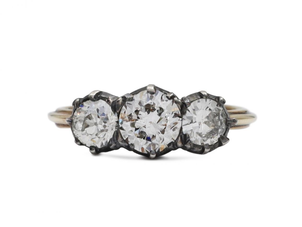 Antique style diamond three stone engagement ring in silver and gold