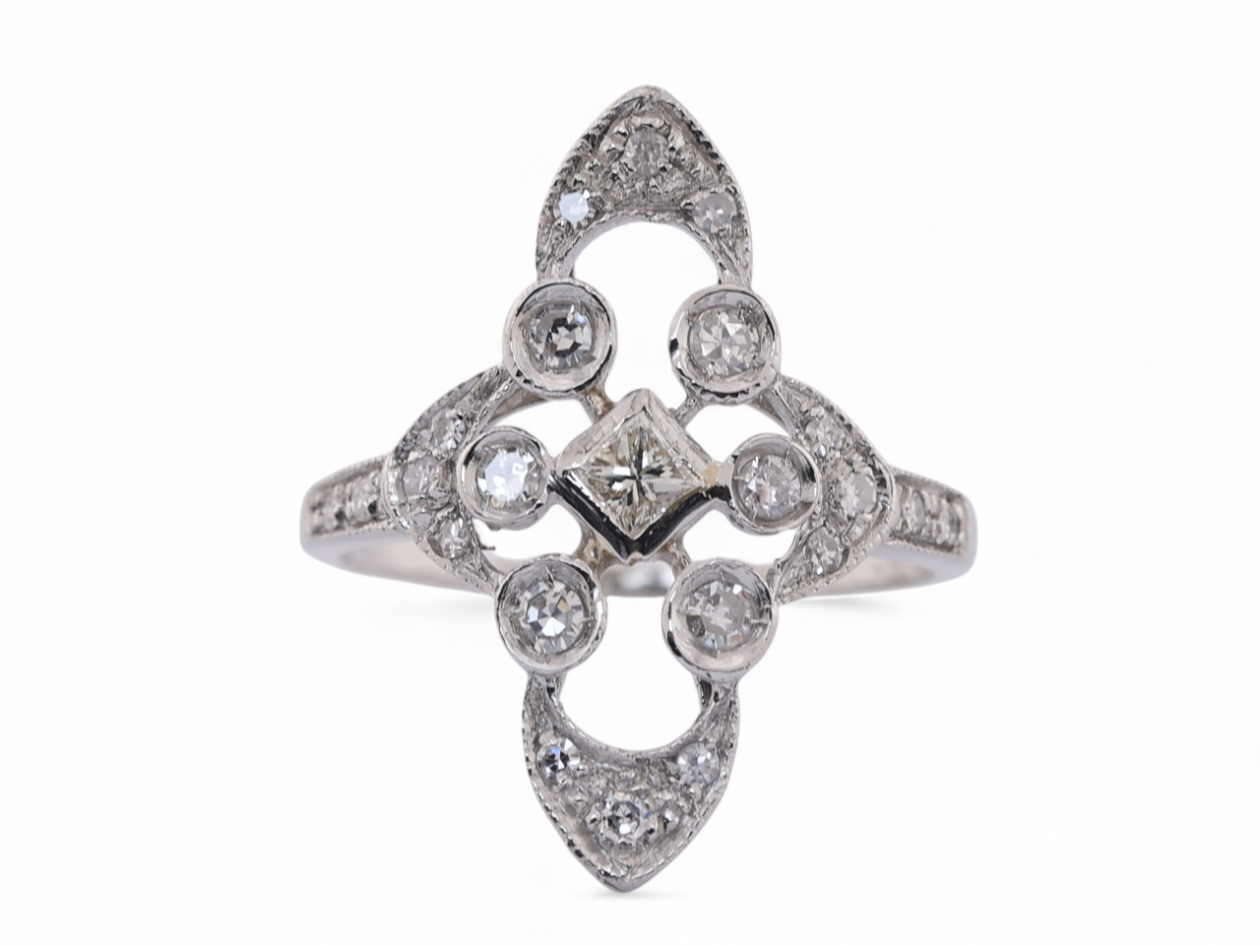 Vintage geometric diamond panel ring in platinum with princess cut centre