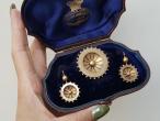 1890s yellow gold and black enamel demi-parure