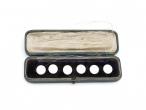 Antique set of round white enamel buttons