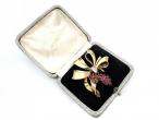 1950s diamond and ruby bow brooch in 18kt yellow gold