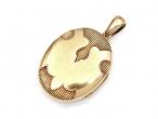 Victorian 15kt yellow gold oval locket with polished banner