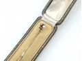 Antique diamond pearl and coral trefoil stick pin in silver and gold