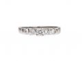 Diamond raised solitaire engagement ring in 18kt white gold