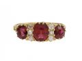 Victorian ruby and diamond three stone carved ring in 18kt yellow gold