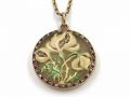 Art Nouveau plique-à-jour flower locket in 18kt yellow gold