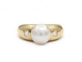 Vintage cultured pearl and diamond solitaire ring in gold