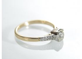 Antique cushion shape diamond solitaire in 18kt gold