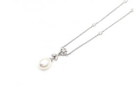Edwardian style cultured pearl and diamond necklace in white gold