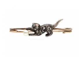 Late Victorian diamond set cat brooch in sliver and gold
