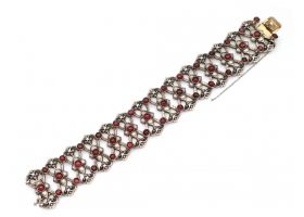 French Art Nouveau silver and gold openwork bracelet set with garnets