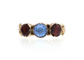 Antique blue paste and garnet foil back three stone ring