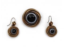 Antique pinchbeck and banded onyx demi-parure