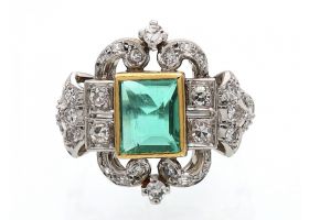 Art Deco emerald and diamond cluster ring in gold and platinum