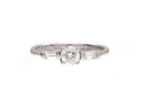 Contemporary diamond solitaire engagement ring in 18kt white gold
