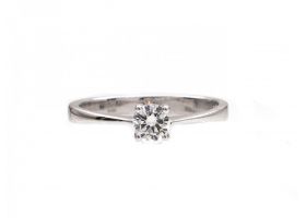 Four claw round brilliant cut diamond solitaire ring