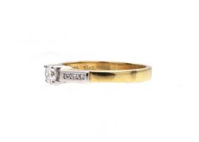 Contemporary diamond solitaire engagement ring in 18kt yellow gold