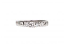 Diamond raised solitaire engagement ring in 18kt white gold