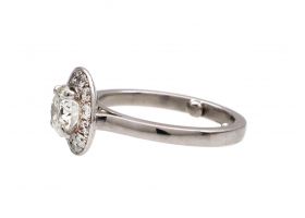 Contemporary diamond halo cluster ring in platinum