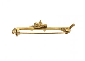 1957 horse head and jockey crop bar brooch in gold