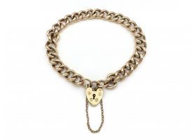 1989 hollow curb link bracelet with heart lock in 9kt yellow gold